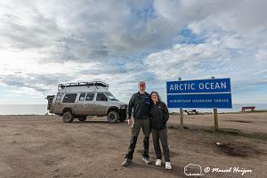 _DSC4613 Marcel Huijser and Bethanie Walder at the end of the Dempster Highway at the Arctic Oce.jpg