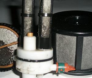 OEM fuel filter with fine paint particles after being macerated by fuel pump.jpg