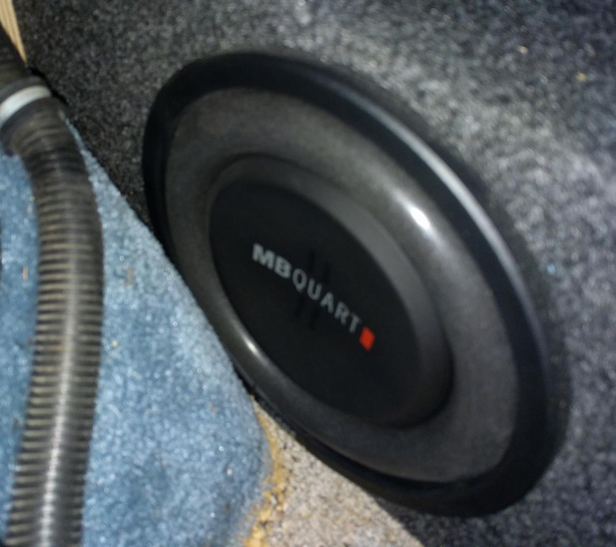 Ray put a new MBQuart subwoofer in!  I love its dedicated volume knob on the dash.
