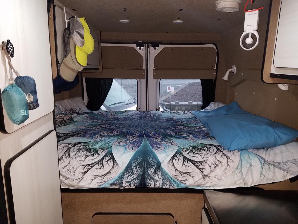 Showing the rear full size Froli Sleep System bed with a nice tapestry i found on ETSY and had a local seamstress sew on a down comforter.