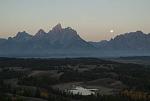 Full moon setting over the Tetons with Hedrick Pond below.