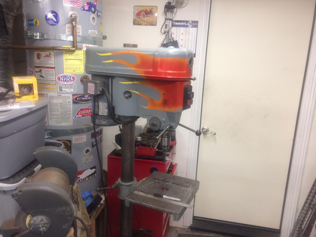 Drill press that I rescued from a backyard, and rebuilt