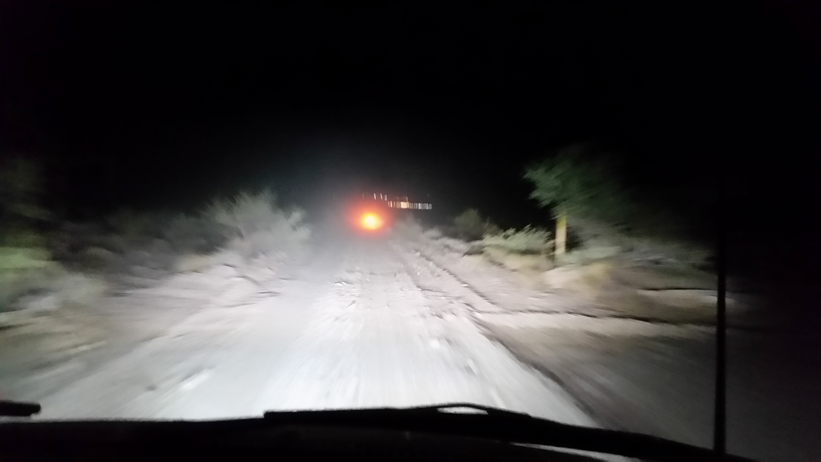 Heading into Primm at night with the HID projectors on high and the 27" led light bar on