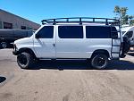 Ford E-Series van with 6" baja Grocery Getter lift kit and Aluminum roof rack and ladder 
www.weldtecdesigns.com