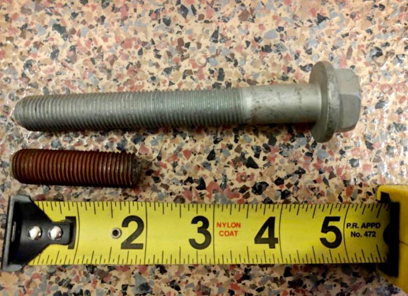 Rear Upper Shock Bolt   New and Sheared
Not my picture, from the Sprinter Forum